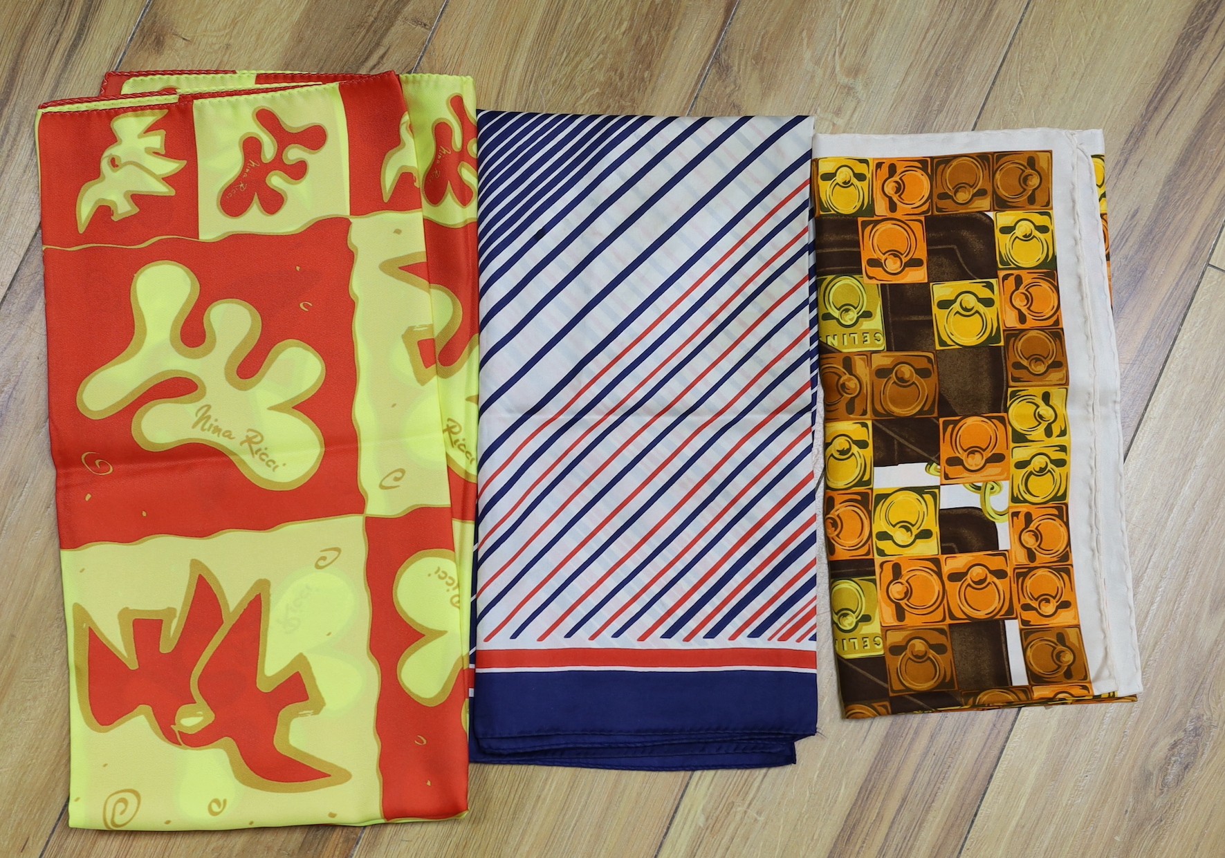 A selection of women's silk scarves, to include Celine, Nina Ricci, Pierre Cardin and others